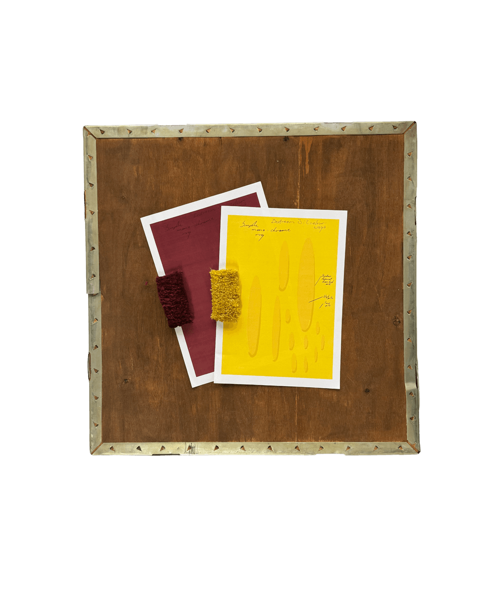 Mood board with maroon and mustard colour swatches and handwritten rug notes